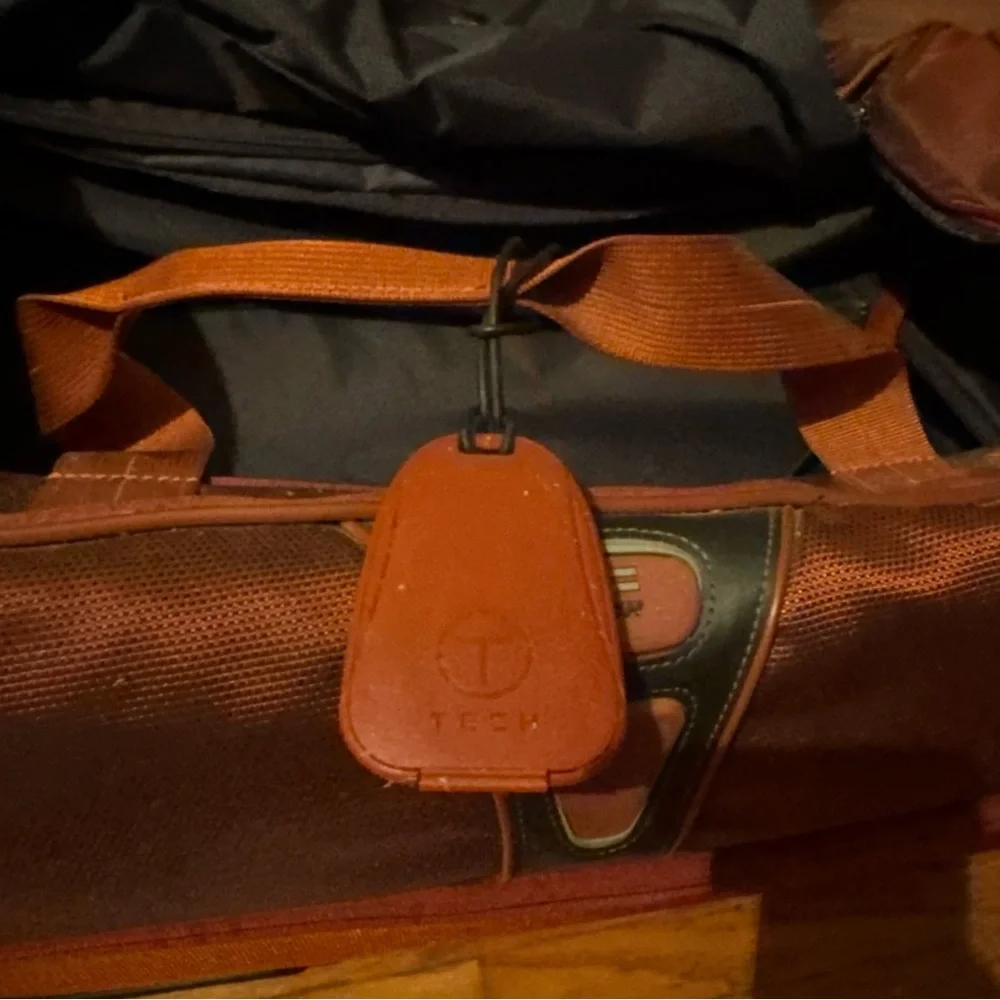 Tumi Rolling Garment Bag in Burnt Orange